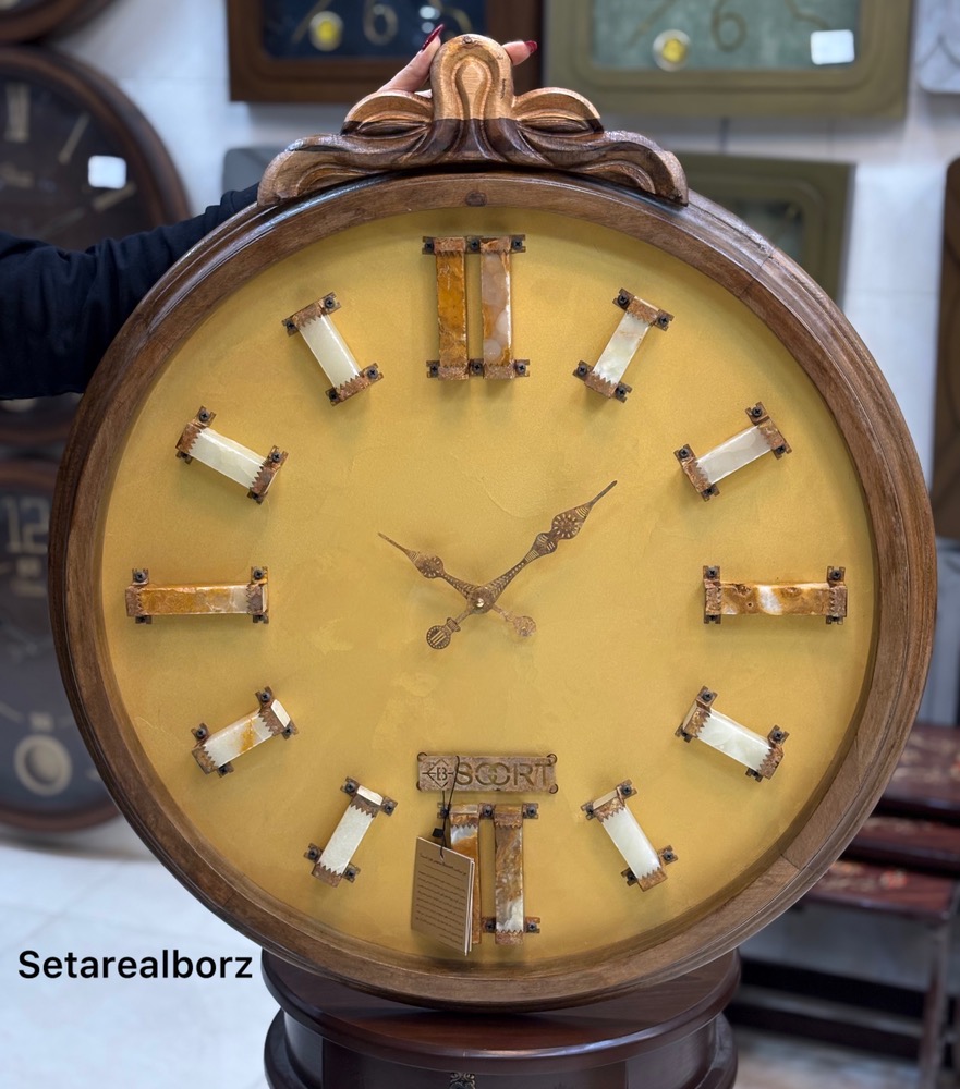 ساعت دیواری طلایی بیسورت